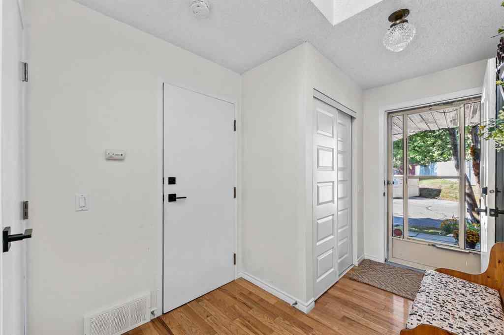 MLS® A2257844 - 210 Queenston Heights SE in Queensland Calgary, Residential