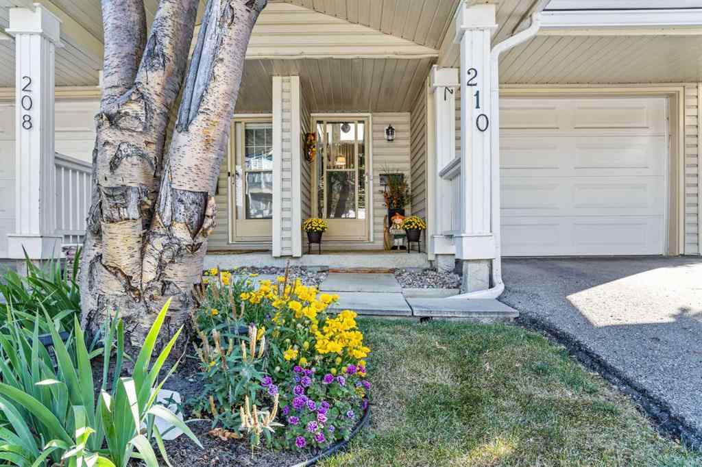 MLS® A2257844 - 210 Queenston Heights SE in Queensland Calgary, Residential
