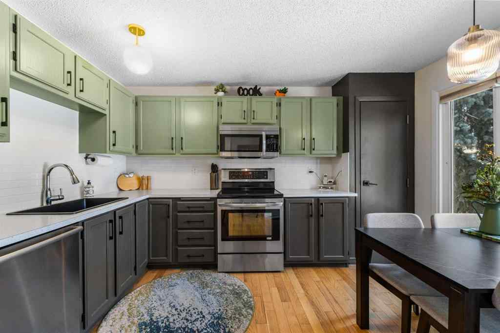 MLS® A2257844 - 210 Queenston Heights SE in Queensland Calgary, Residential