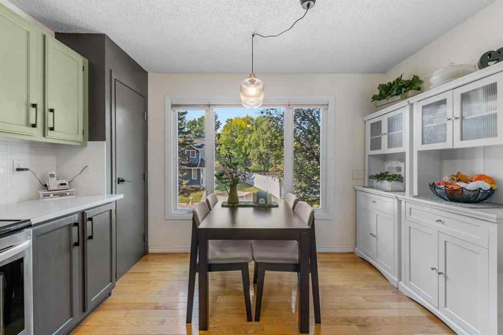 MLS® A2257844 - 210 Queenston Heights SE in Queensland Calgary, Residential