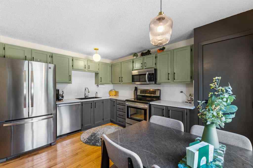 MLS® A2257844 - 210 Queenston Heights SE in Queensland Calgary, Residential