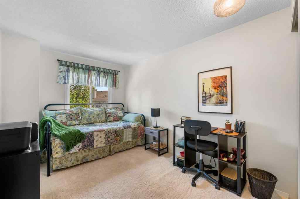 MLS® A2257844 - 210 Queenston Heights SE in Queensland Calgary, Residential