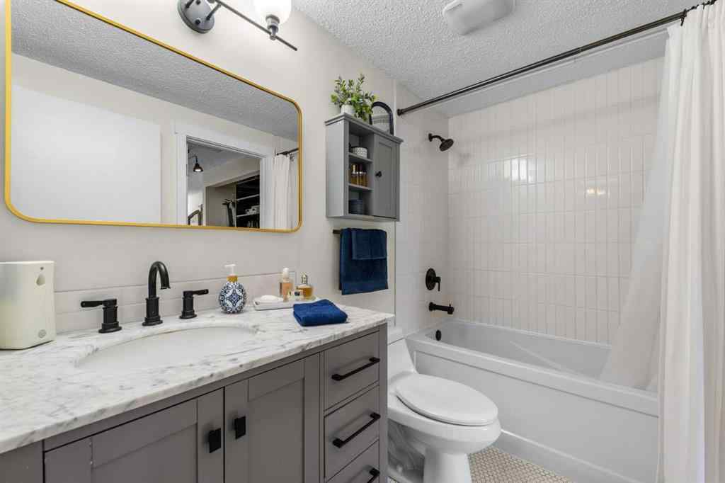 MLS® A2257844 - 210 Queenston Heights SE in Queensland Calgary, Residential