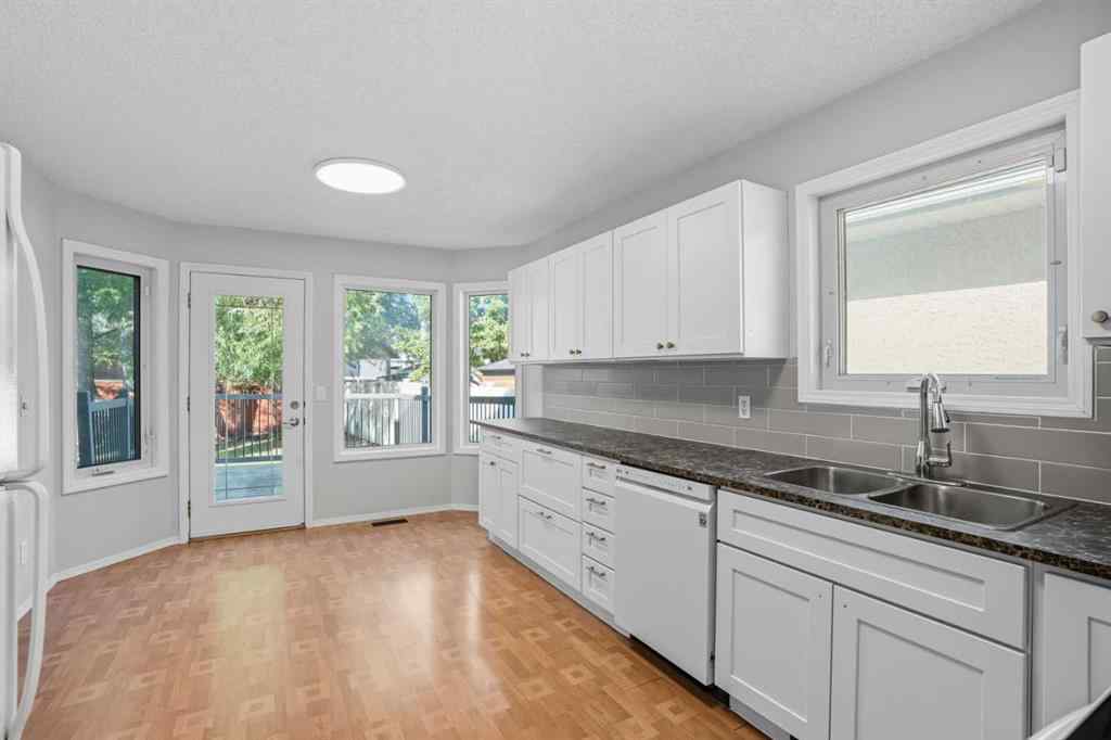 MLS® A2257845 - 447 Shawbrooke Circle SW in Shawnessy Calgary, Residential