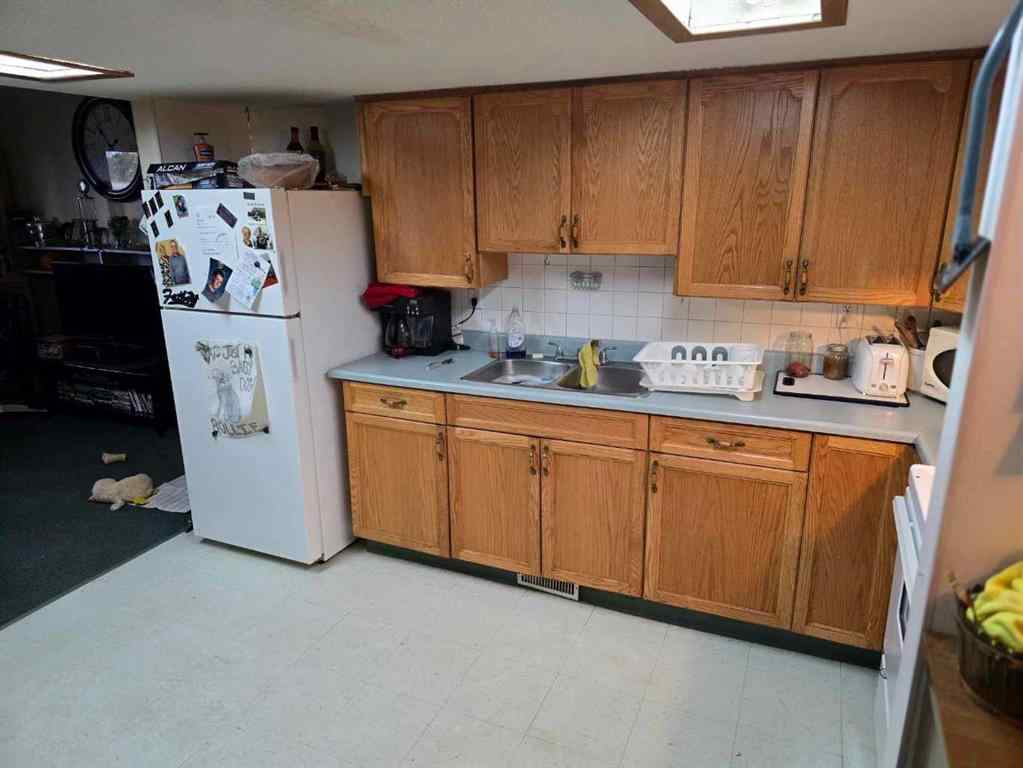 MLS® A2257846 - Unit #1-7 205 Reed Avenue  in Hayter Hayter, Multi-Family