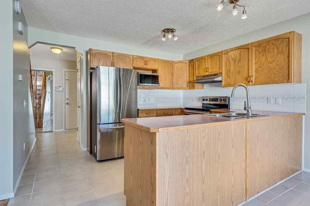 MLS® A2257850 - 26 River Rock Crescent SE in Riverbend Calgary, Residential