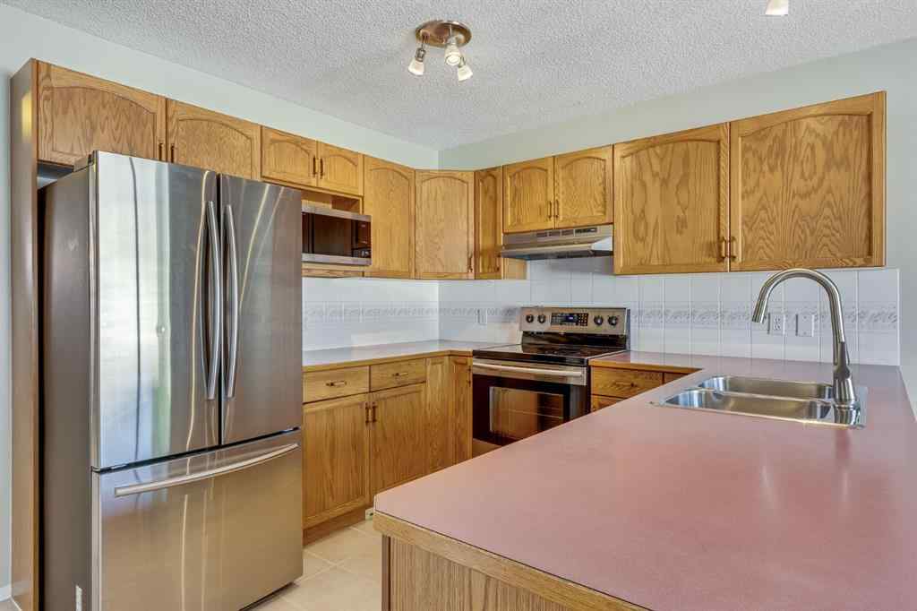 MLS® A2257850 - 26 River Rock Crescent SE in Riverbend Calgary, Residential