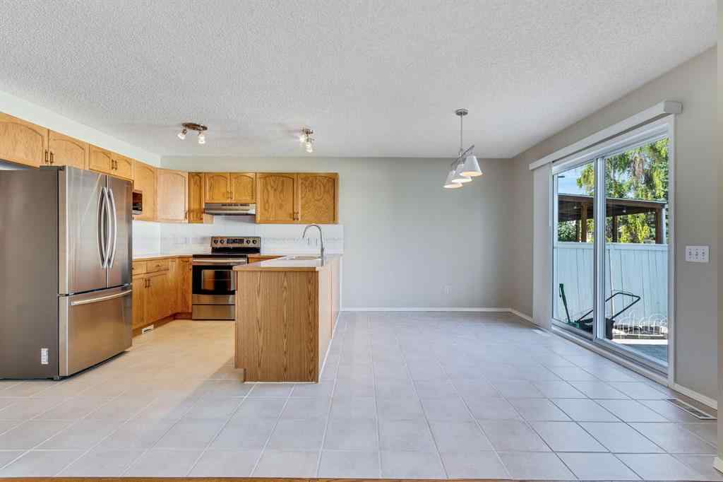 MLS® A2257850 - 26 River Rock Crescent SE in Riverbend Calgary, Residential
