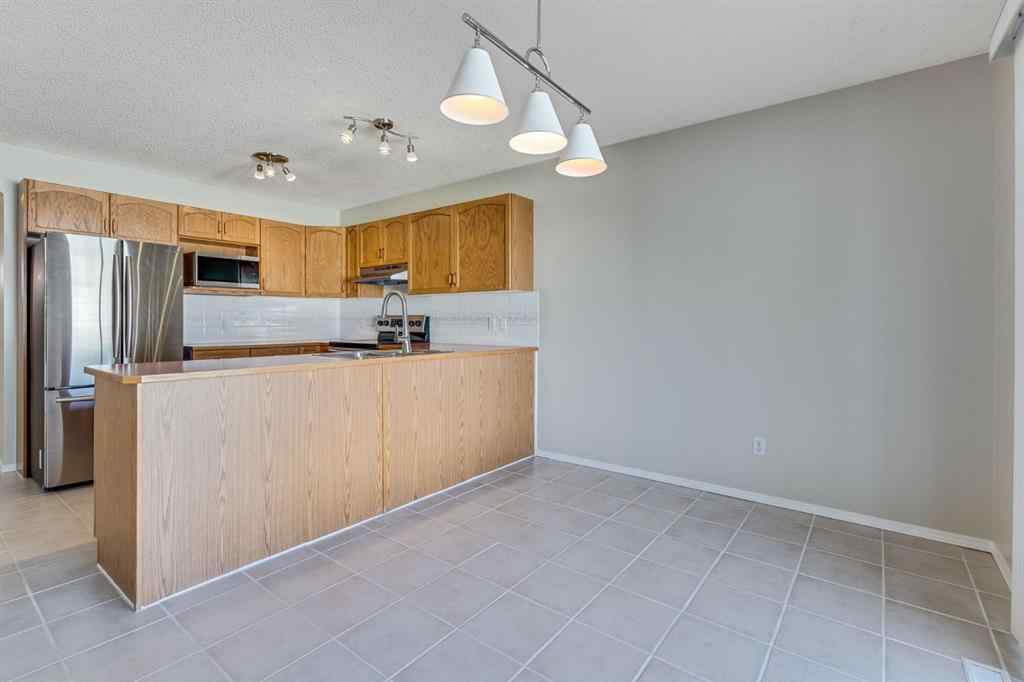 MLS® A2257850 - 26 River Rock Crescent SE in Riverbend Calgary, Residential