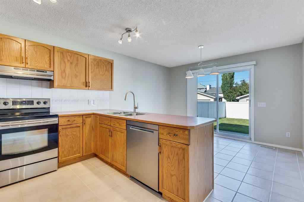 MLS® A2257850 - 26 River Rock Crescent SE in Riverbend Calgary, Residential