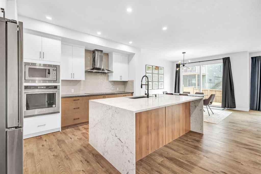 MLS® A2257851 - 53 Amblehurst Gardens NW in Moraine Calgary, Residential