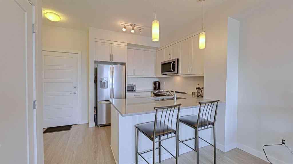 MLS® A2257865 - Unit #403 300 Auburn Meadows Manor SE in Auburn Bay Calgary, Residential