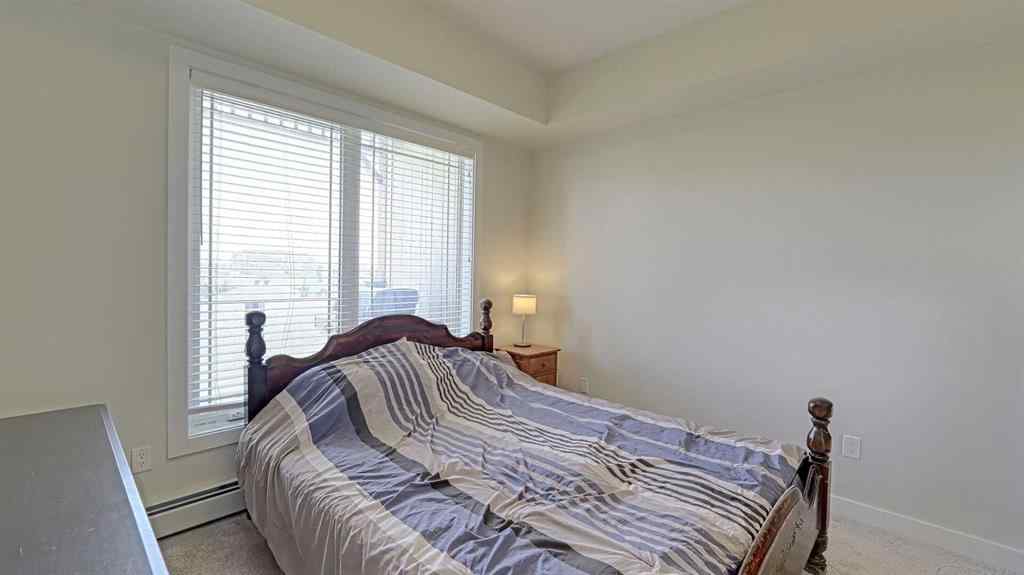 MLS® A2257865 - Unit #403 300 Auburn Meadows Manor SE in Auburn Bay Calgary, Residential
