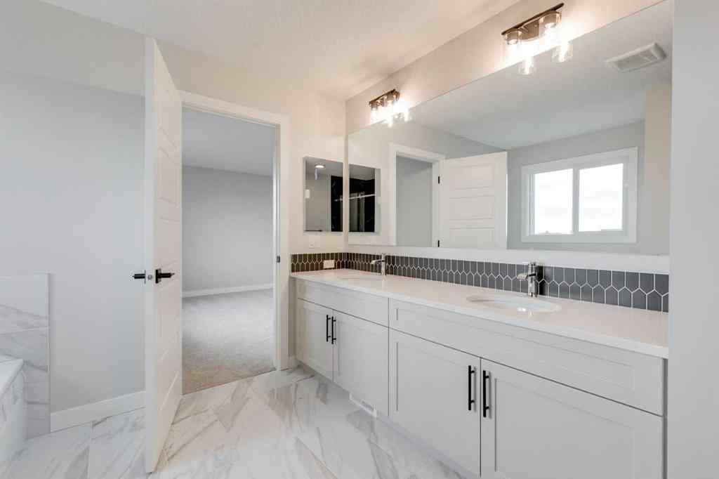 MLS® A2257903 - 297 Dawson Wharf Road S in Dawson\'s Landing Chestermere, Residential