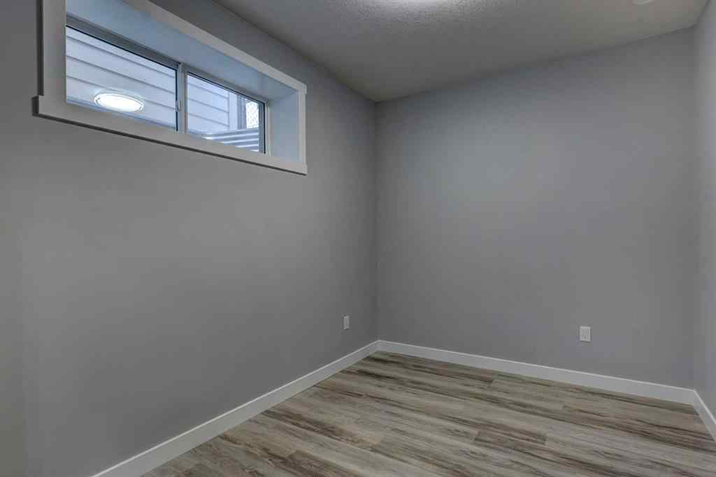 MLS® A2257906 - 878 Bluerock Way SW in Alpine Park Calgary, Residential