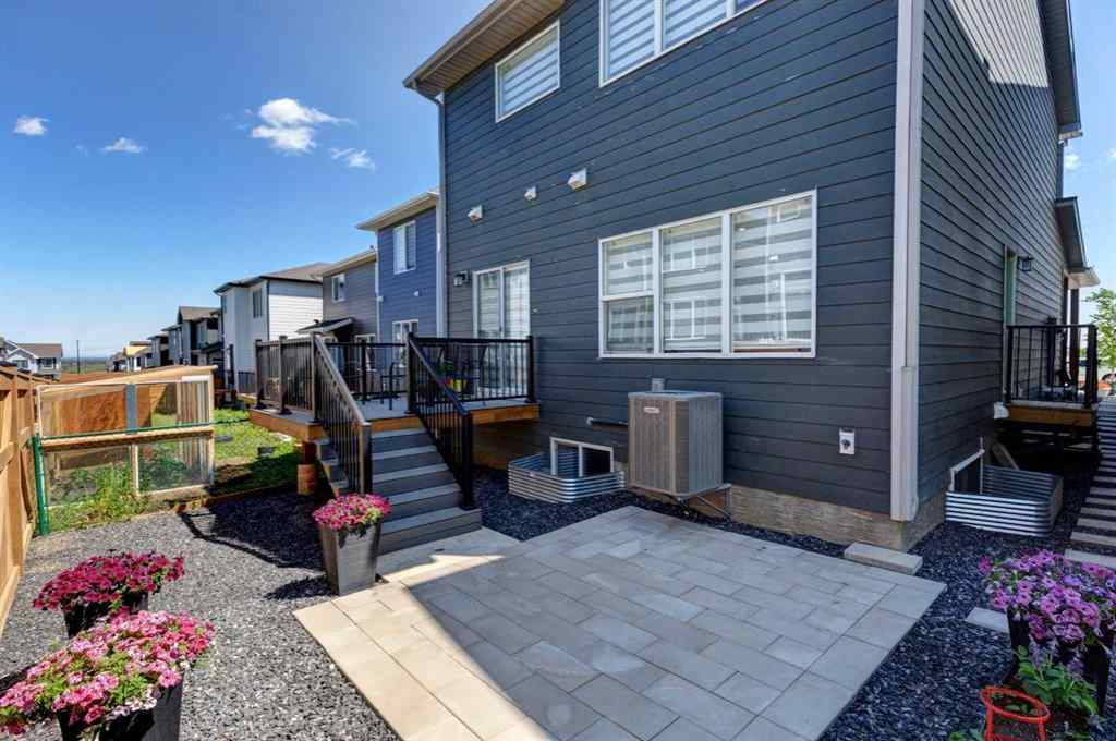 MLS® A2257906 - 878 Bluerock Way SW in Alpine Park Calgary, Residential