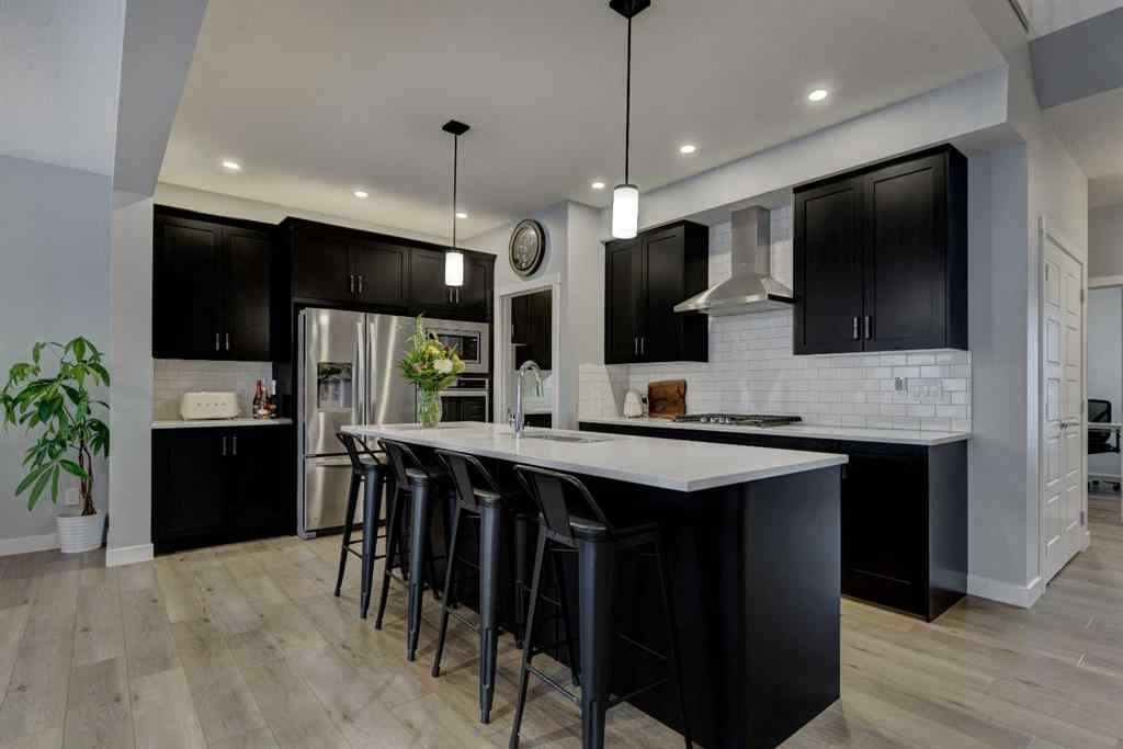 MLS® A2257906 - 878 Bluerock Way SW in Alpine Park Calgary, Residential