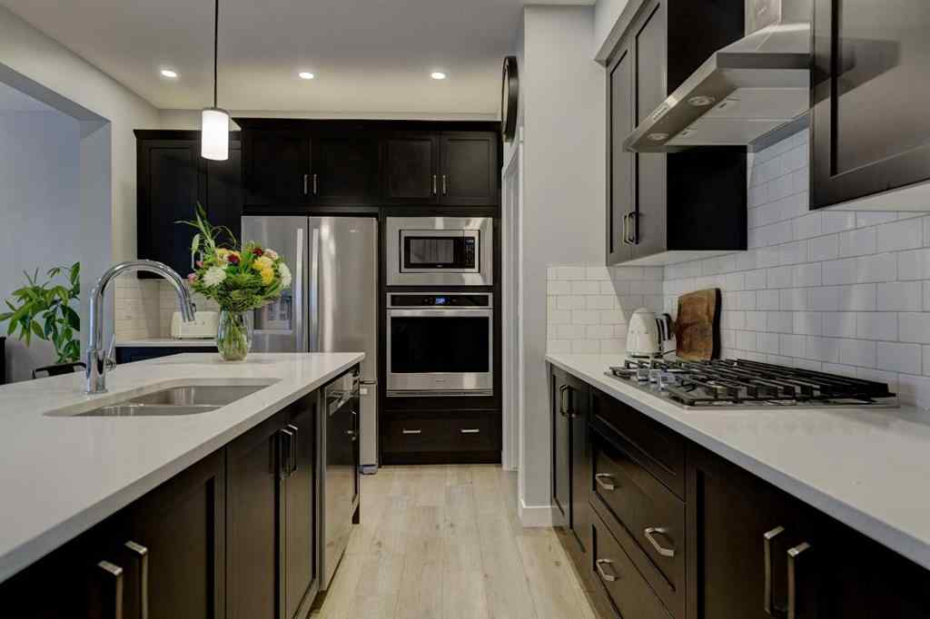 MLS® A2257906 - 878 Bluerock Way SW in Alpine Park Calgary, Residential