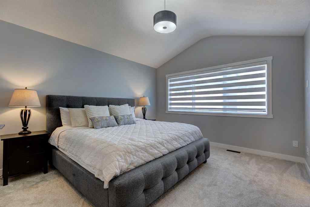 MLS® A2257906 - 878 Bluerock Way SW in Alpine Park Calgary, Residential