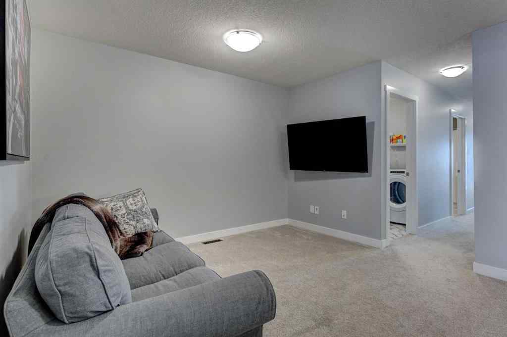 MLS® A2257906 - 878 Bluerock Way SW in Alpine Park Calgary, Residential