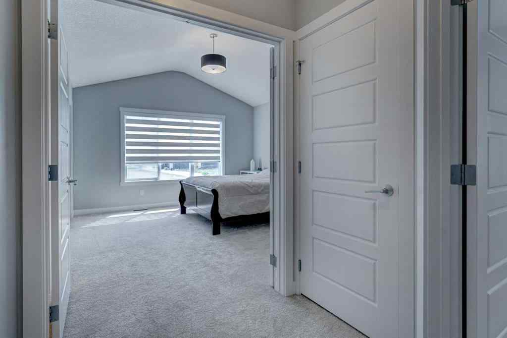 MLS® A2257906 - 878 Bluerock Way SW in Alpine Park Calgary, Residential