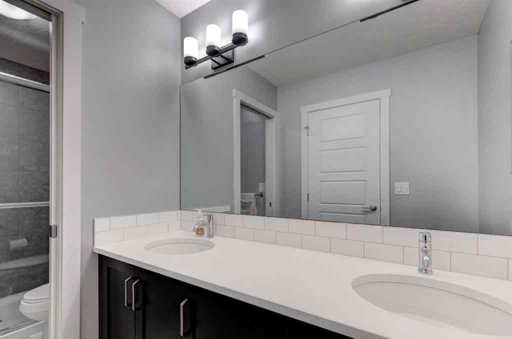 MLS® A2257906 - 878 Bluerock Way SW in Alpine Park Calgary, Residential