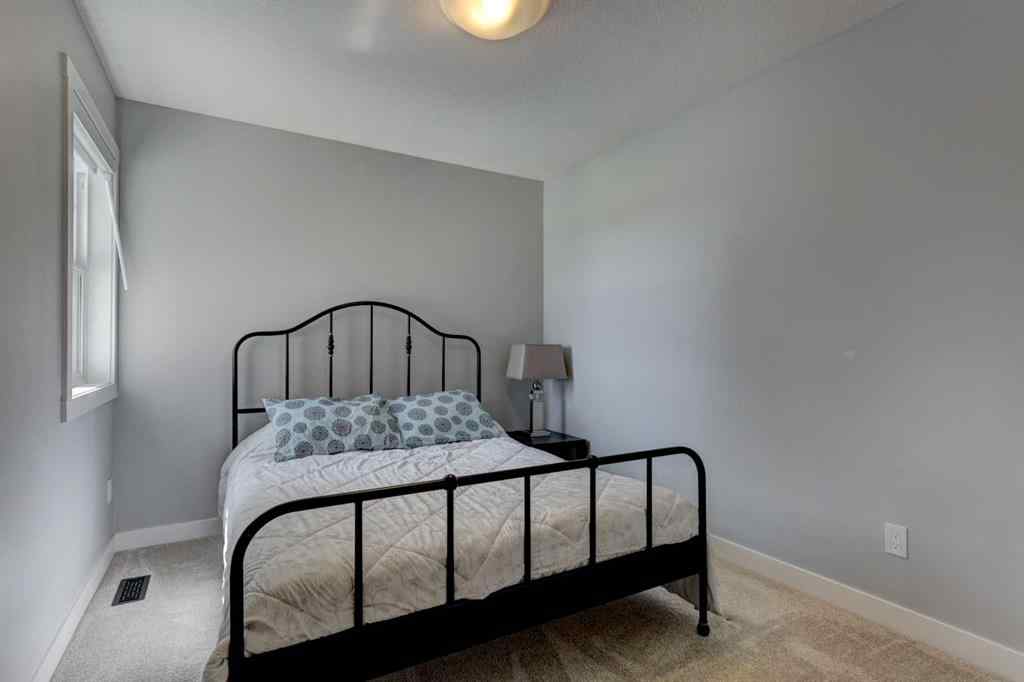 MLS® A2257906 - 878 Bluerock Way SW in Alpine Park Calgary, Residential