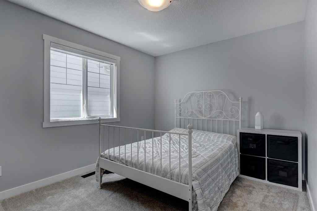 MLS® A2257906 - 878 Bluerock Way SW in Alpine Park Calgary, Residential