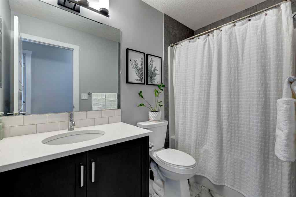 MLS® A2257906 - 878 Bluerock Way SW in Alpine Park Calgary, Residential