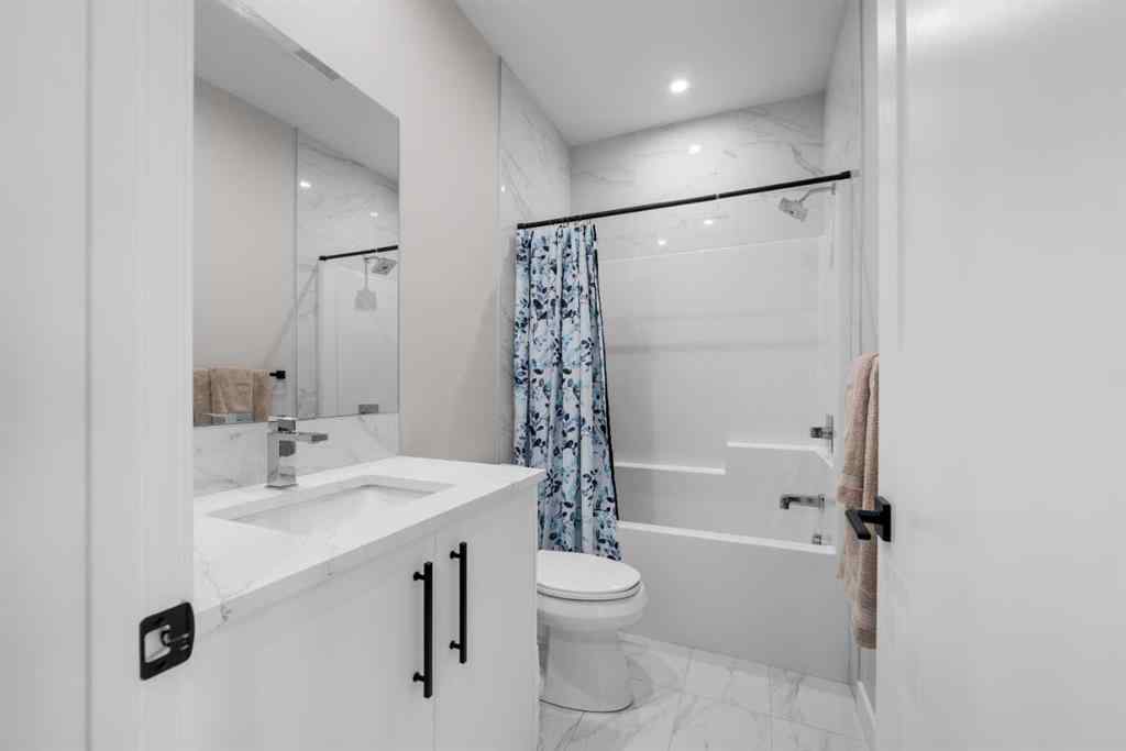 MLS® A2257907 - 8161 8 Avenue SW in West Springs Calgary, Residential