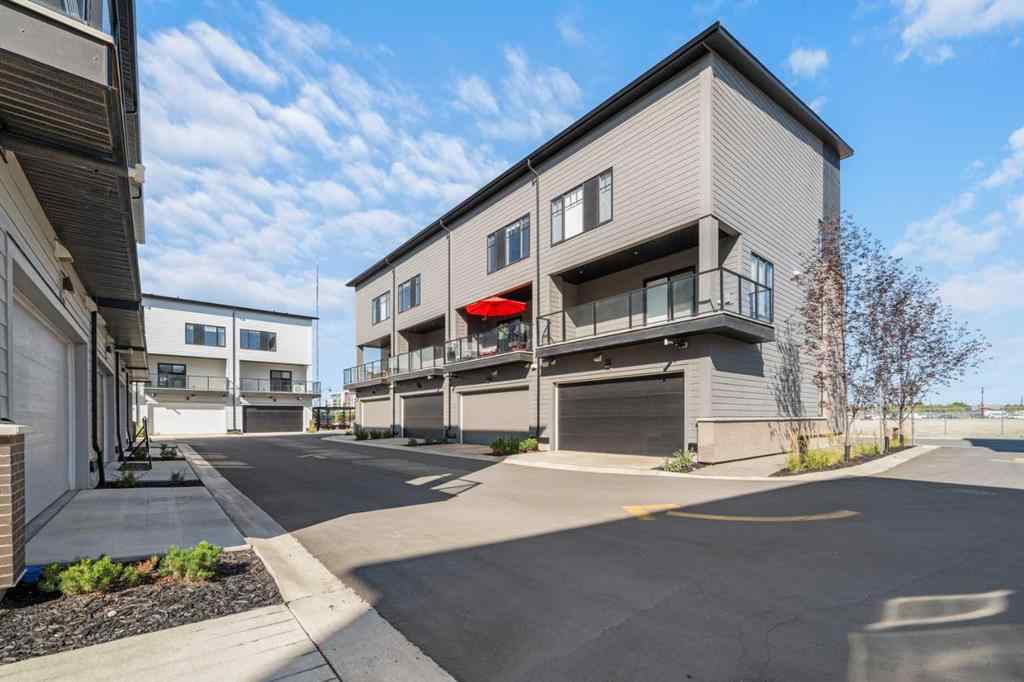 MLS® A2257907 - 8161 8 Avenue SW in West Springs Calgary, Residential