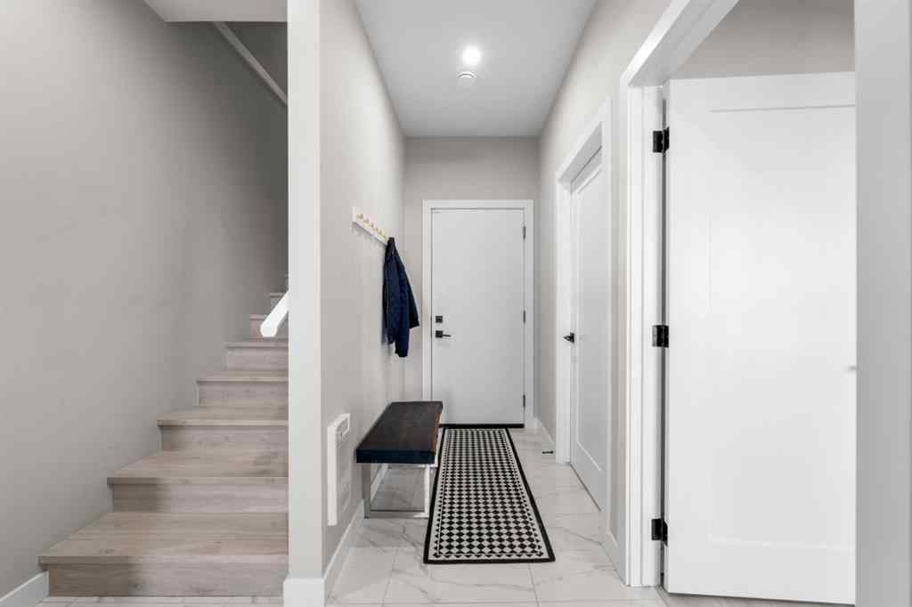MLS® A2257907 - 8161 8 Avenue SW in West Springs Calgary, Residential