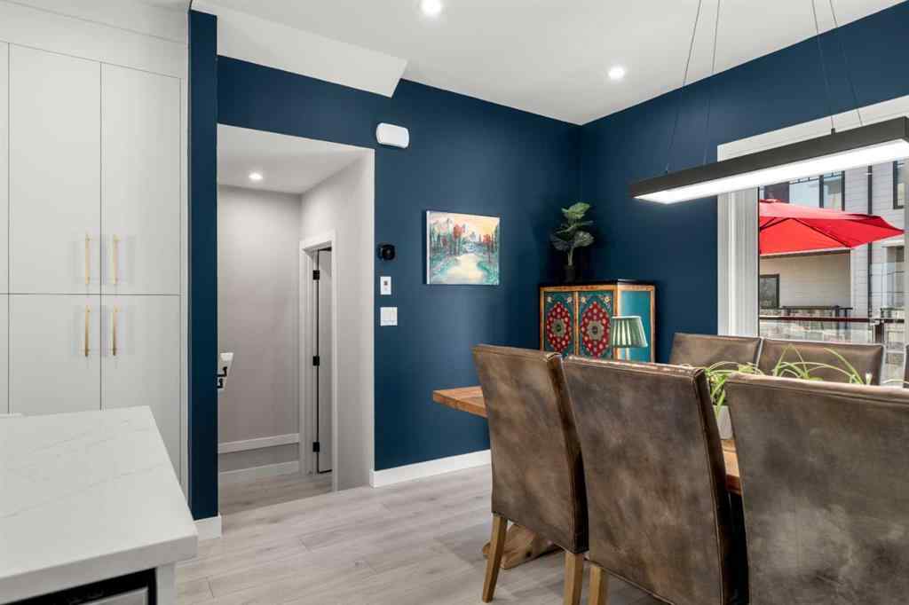 MLS® A2257907 - 8161 8 Avenue SW in West Springs Calgary, Residential