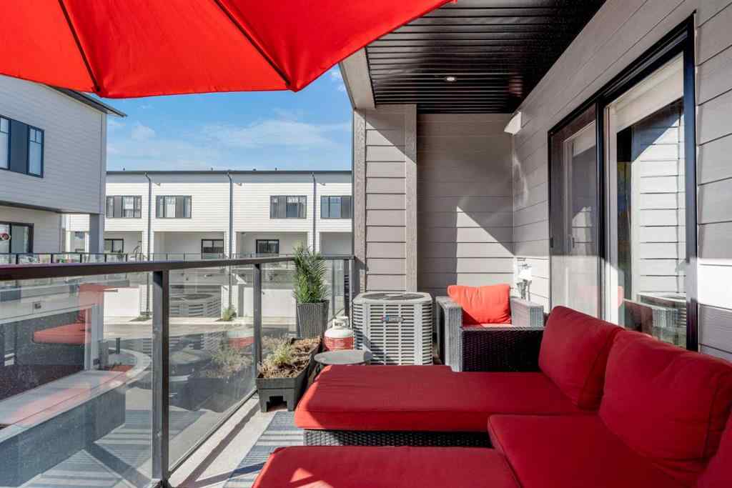 MLS® A2257907 - 8161 8 Avenue SW in West Springs Calgary, Residential