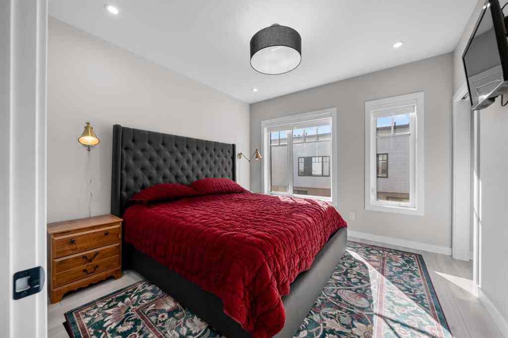 MLS® A2257907 - 8161 8 Avenue SW in West Springs Calgary, Residential