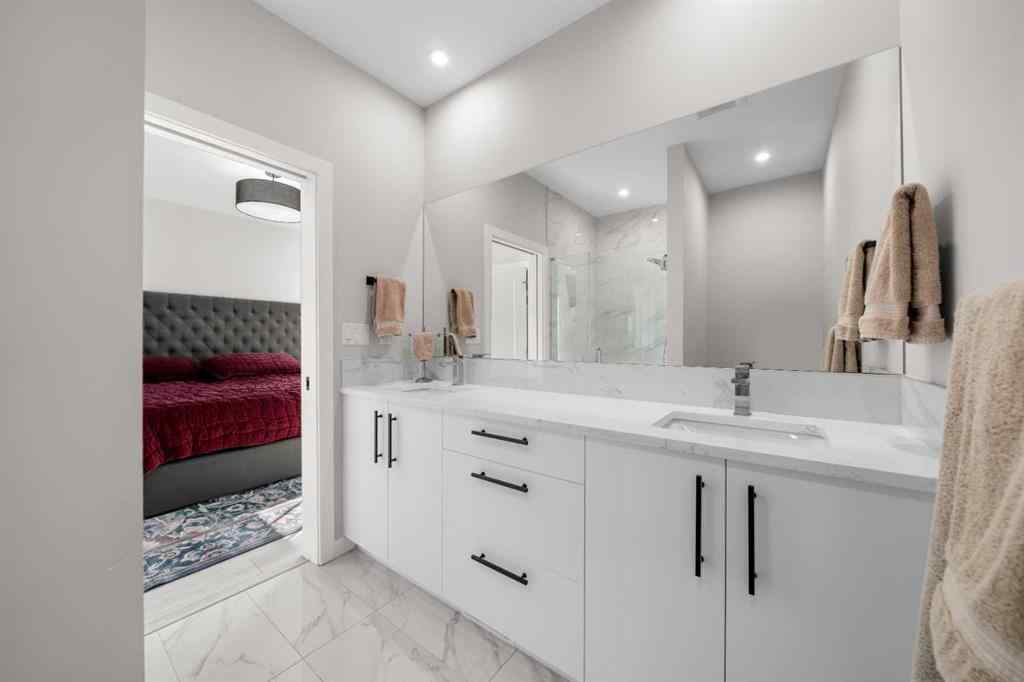 MLS® A2257907 - 8161 8 Avenue SW in West Springs Calgary, Residential