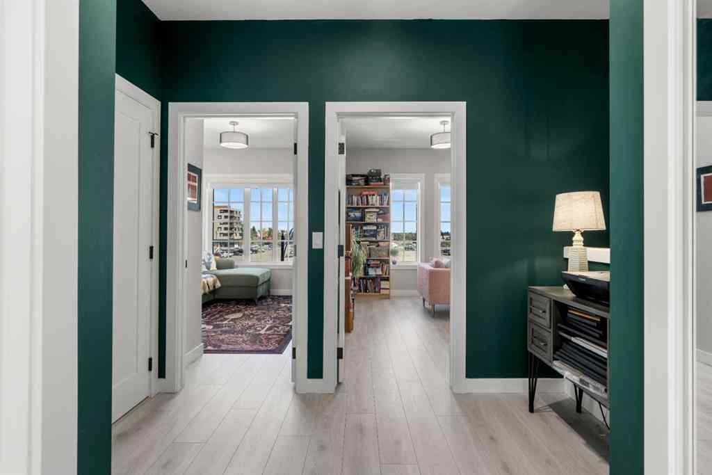 MLS® A2257907 - 8161 8 Avenue SW in West Springs Calgary, Residential