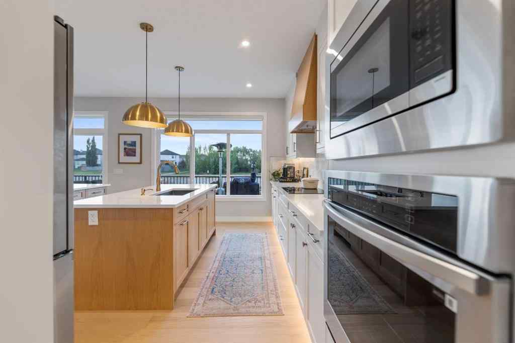 MLS® A2257937 - 224 South Shore View  in South Shores Chestermere, Residential