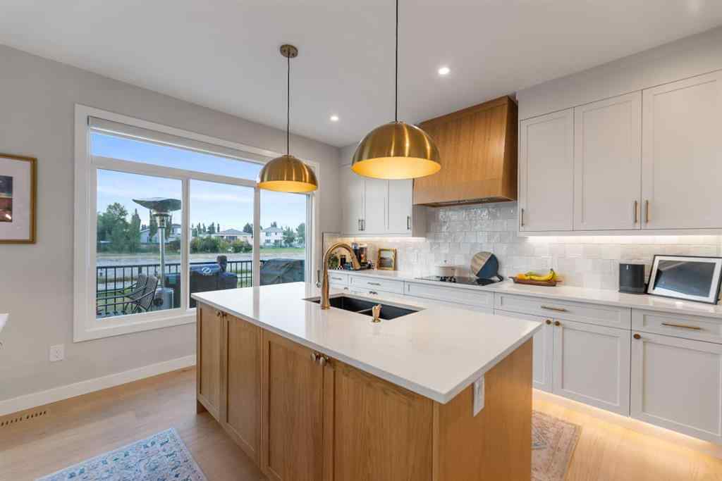 MLS® A2257937 - 224 South Shore View  in South Shores Chestermere, Residential