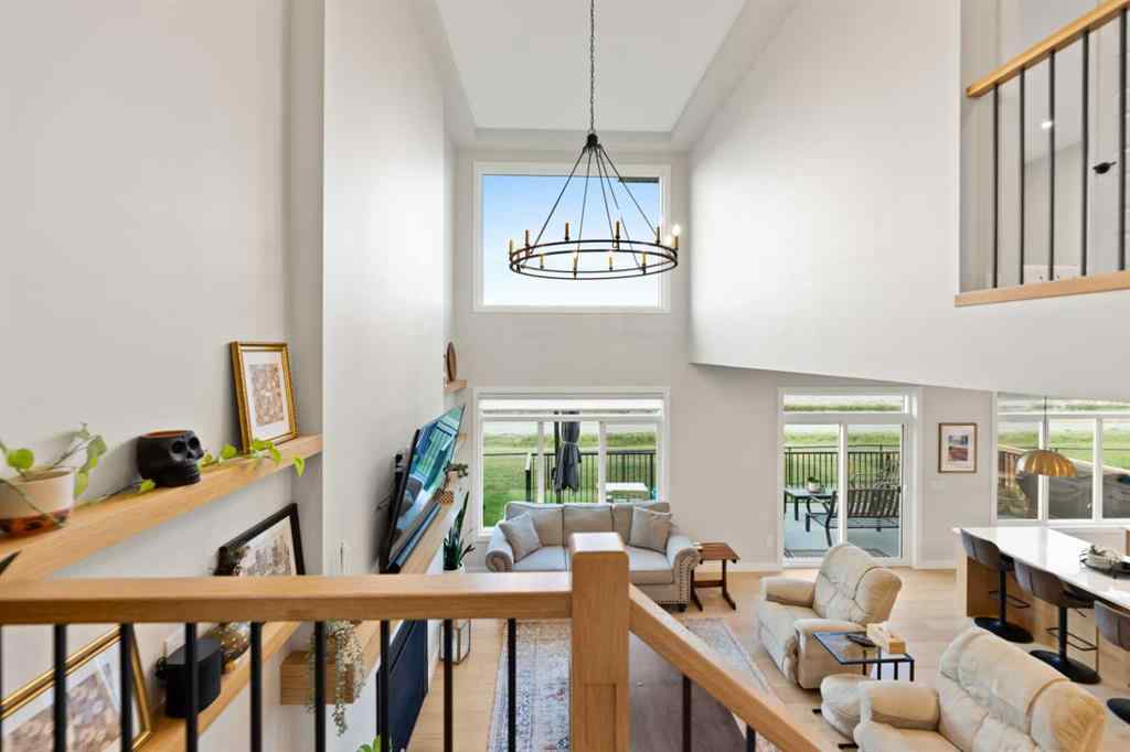 MLS® A2257937 - 224 South Shore View  in South Shores Chestermere, Residential
