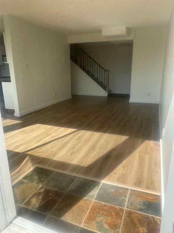 MLS® A2257943 - Unit #101 607 69 Avenue SW in Kingsland Calgary, Residential