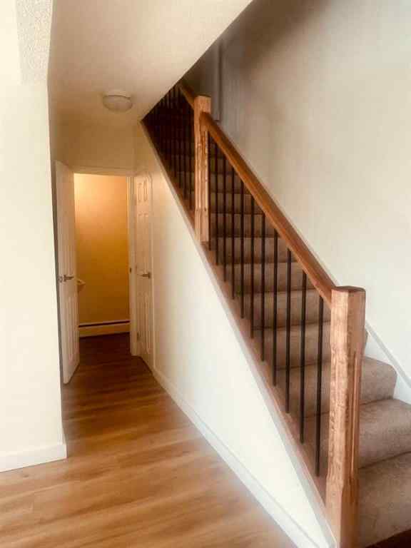 MLS® A2257943 - Unit #101 607 69 Avenue SW in Kingsland Calgary, Residential