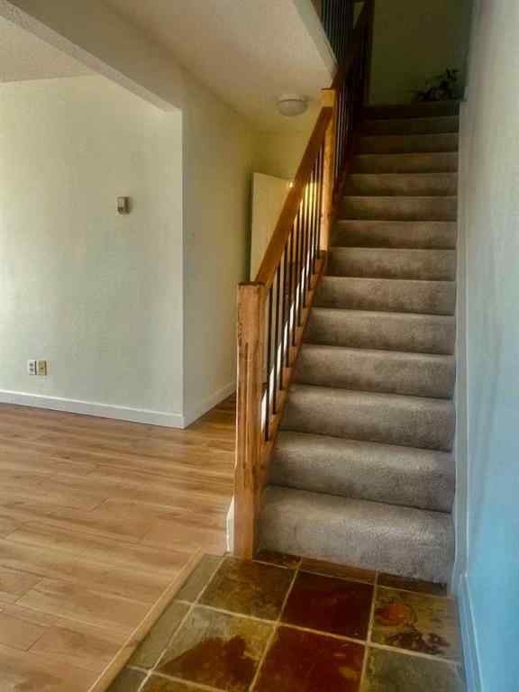 MLS® A2257943 - Unit #101 607 69 Avenue SW in Kingsland Calgary, Residential