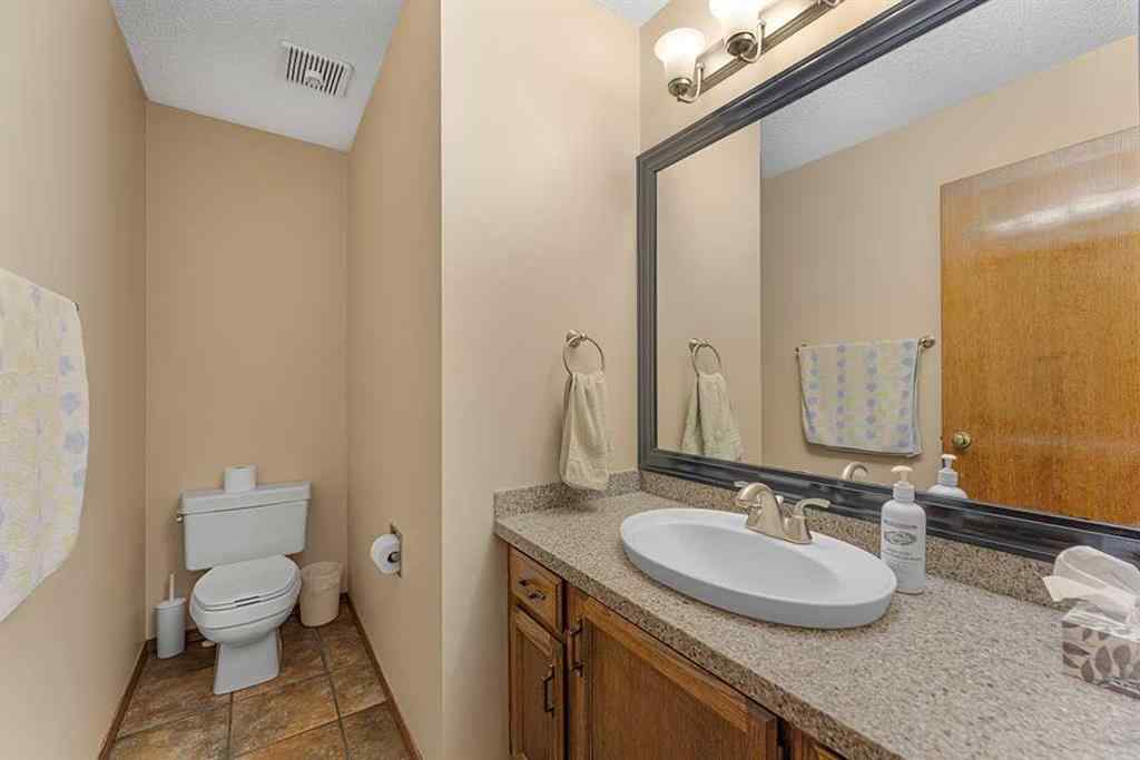 MLS® A2257970 - 116 Sundown Way SE in Sundance Calgary, Residential