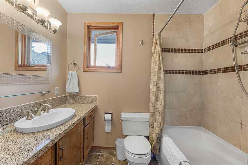 MLS® A2257970 - 116 Sundown Way SE in Sundance Calgary, Residential