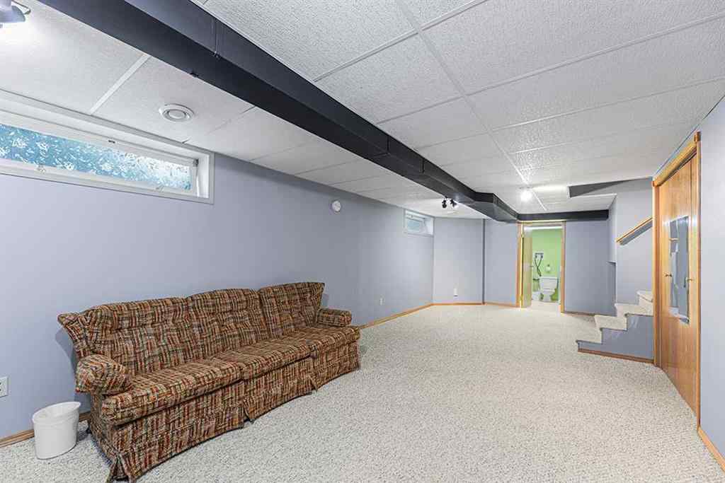 MLS® A2257970 - 116 Sundown Way SE in Sundance Calgary, Residential