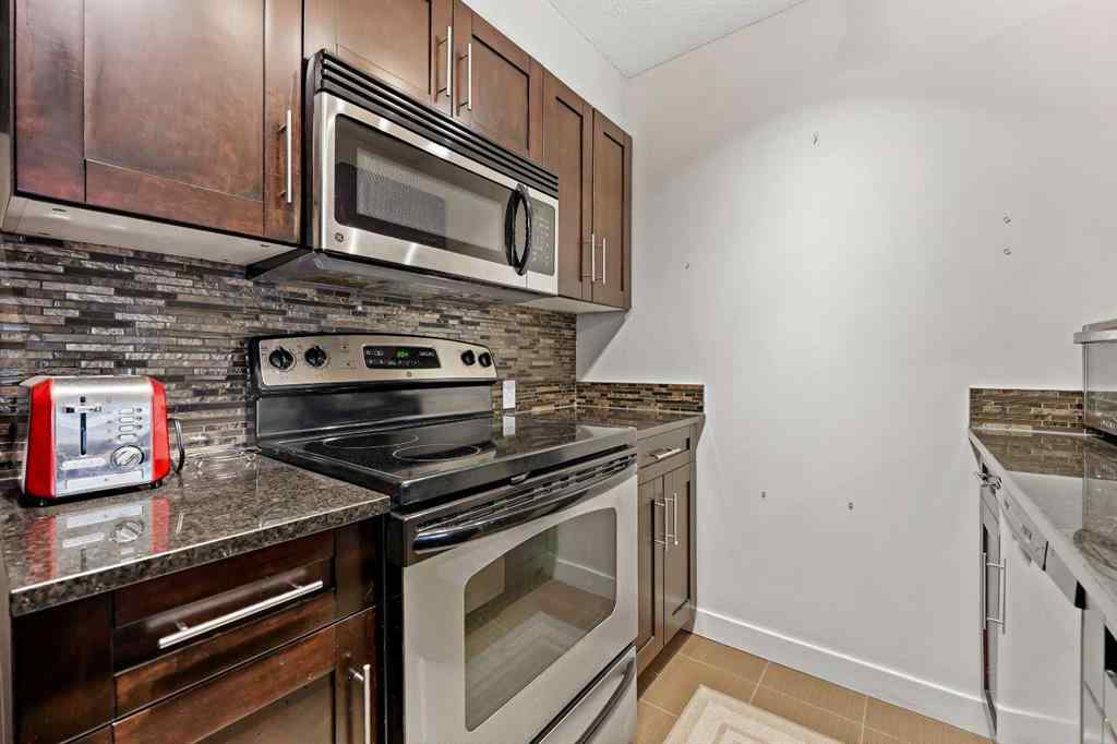MLS® A2257990 - Unit #2212 403 Mackenzie Way SW in Downtown Airdrie, Residential