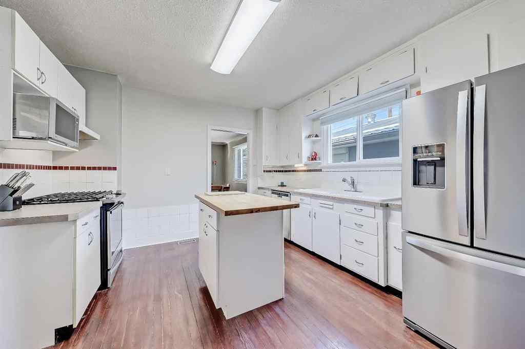 MLS® A2257994 - 1404 11 Avenue SE in Inglewood Calgary, Residential
