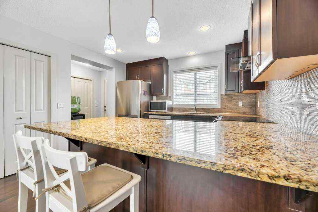 MLS® A2258026 - 4040 New Brighton Grove SE in New Brighton Calgary, Residential