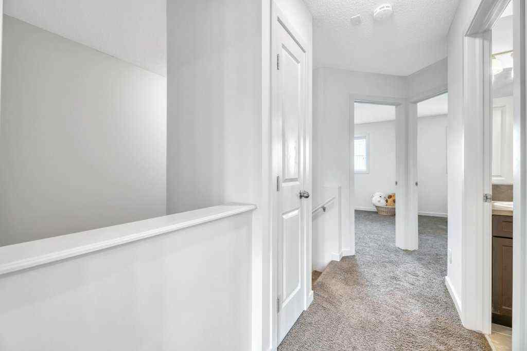 MLS® A2258026 - 4040 New Brighton Grove SE in New Brighton Calgary, Residential